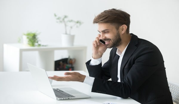 a man is speaking on phone