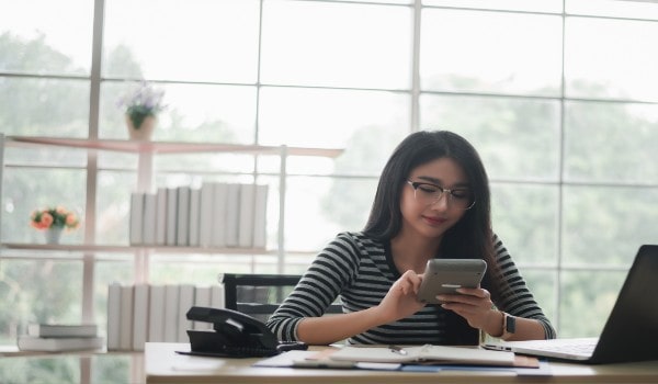 a girl is using phone