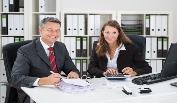 a girl and a boy are working together