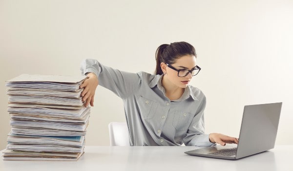 pile of files is lying on table