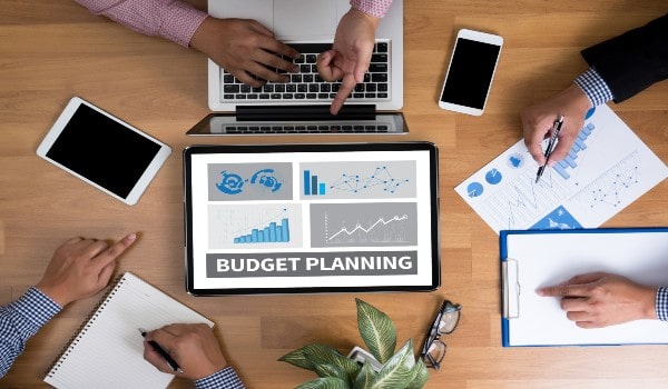 a group of people is doing budget planning